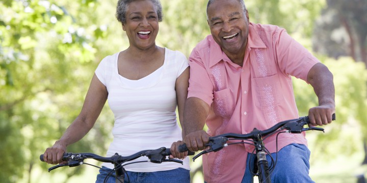 Happy seniors on a bike ride