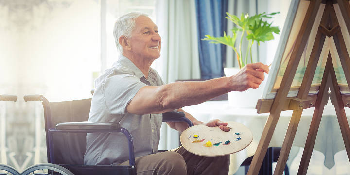 Retired Man Working on a Painting