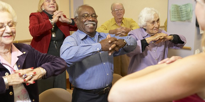 Group of Seniors Enjoying Nursing Home Activities