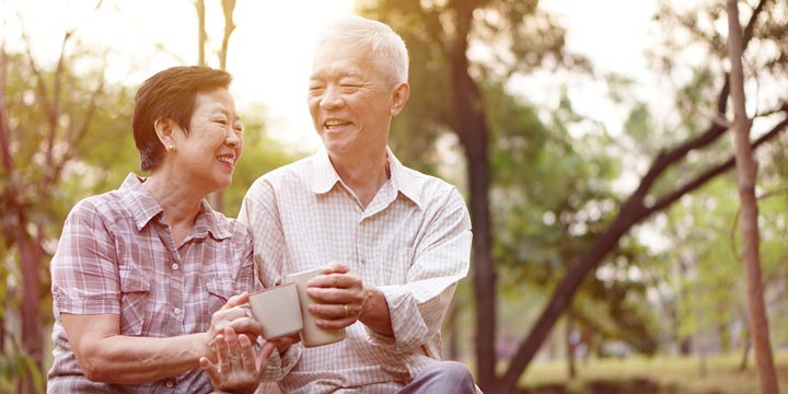 Happy Seniors Couple Having Coffee