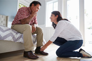 Caregiver Assisting a Senior Resident