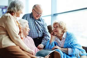 Group of Seniors Visiting