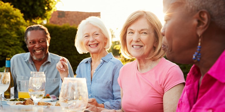 Seniors socializing over dinner