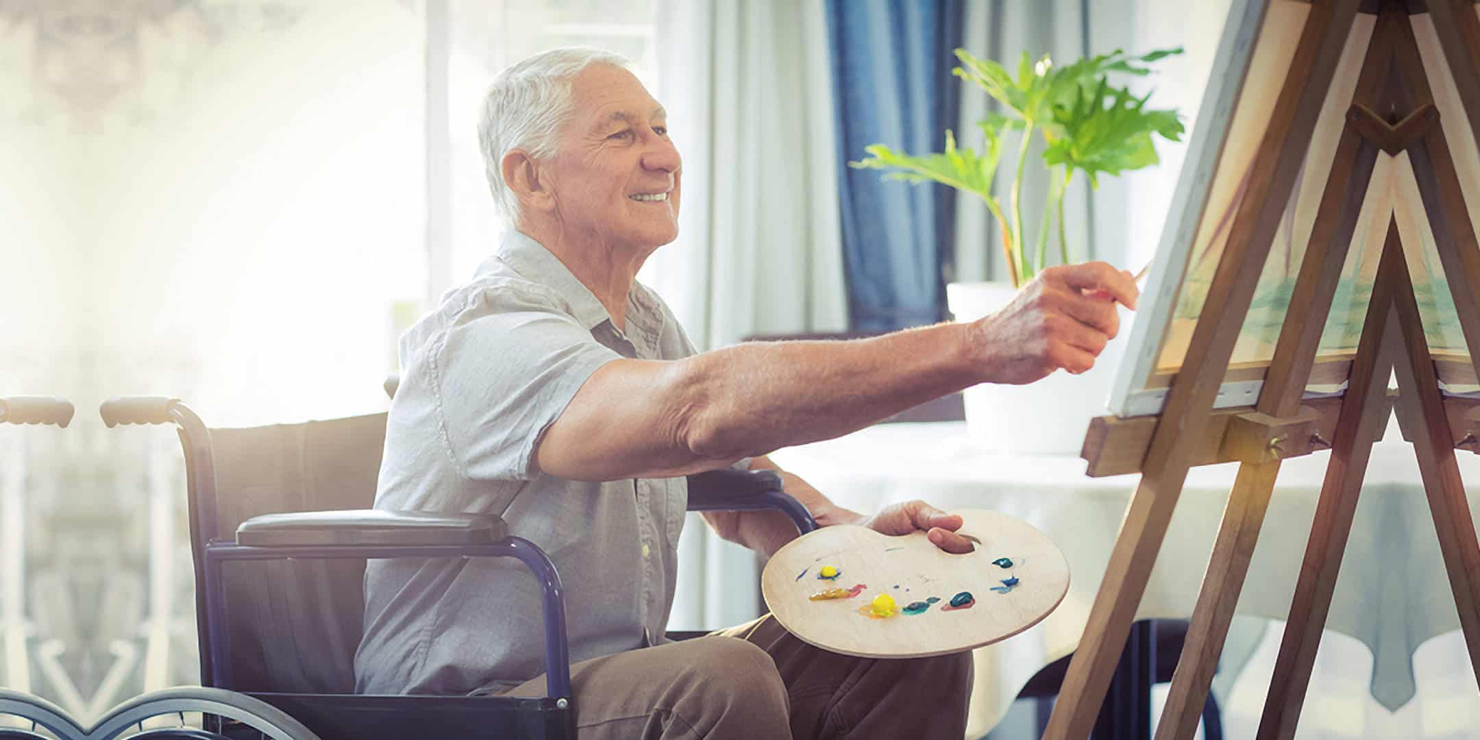 Retired Man Working on a Painting