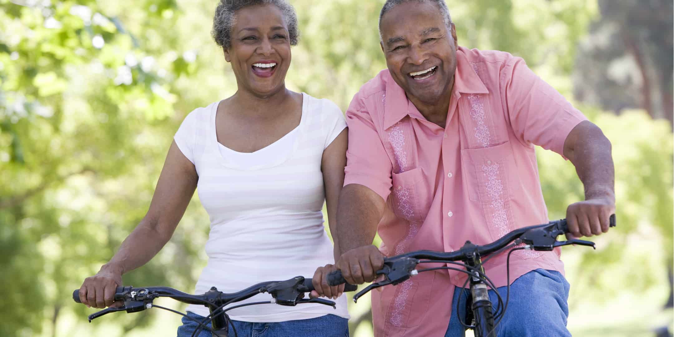 Happy seniors on a bike ride