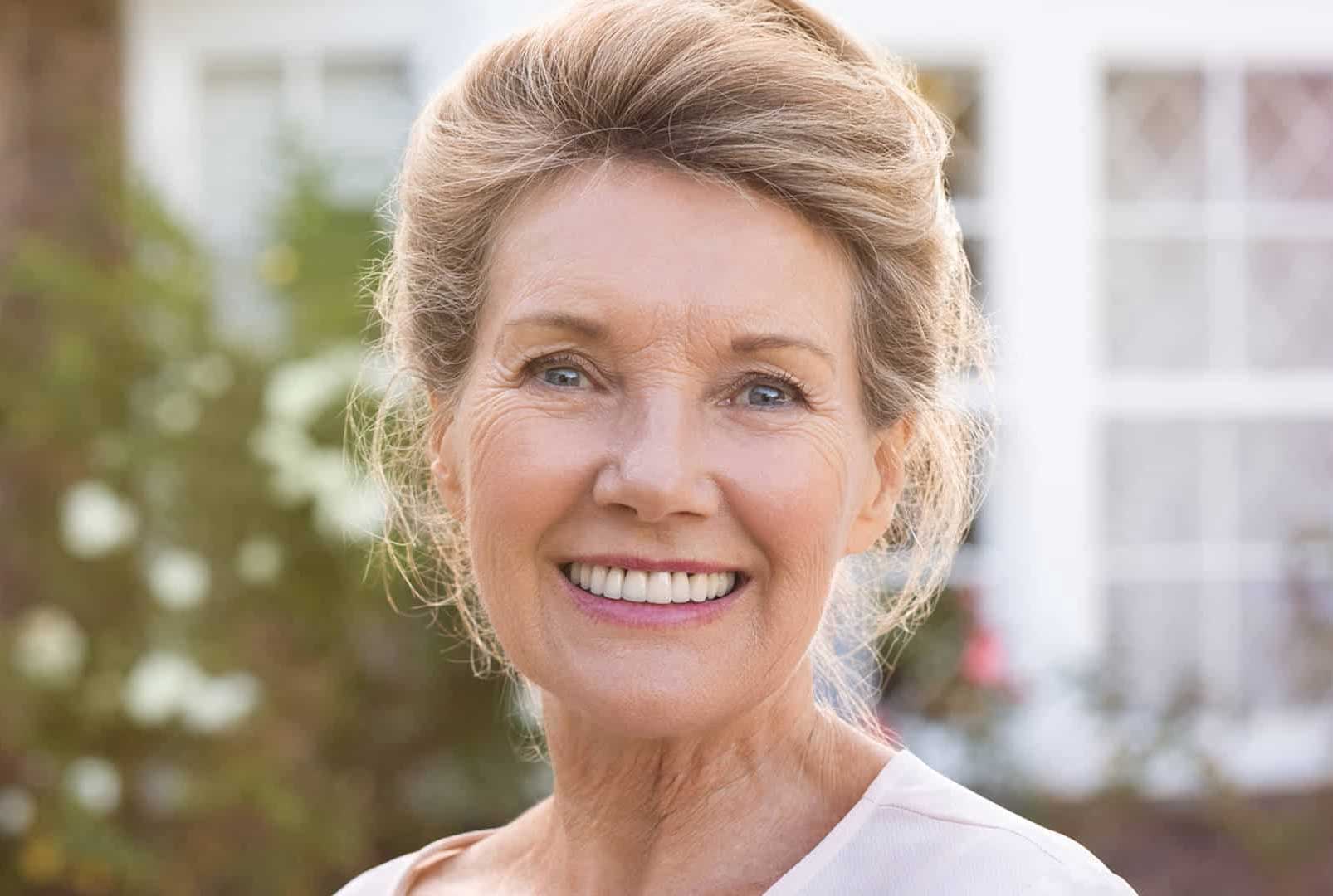 Happy Senior Smiling Outside