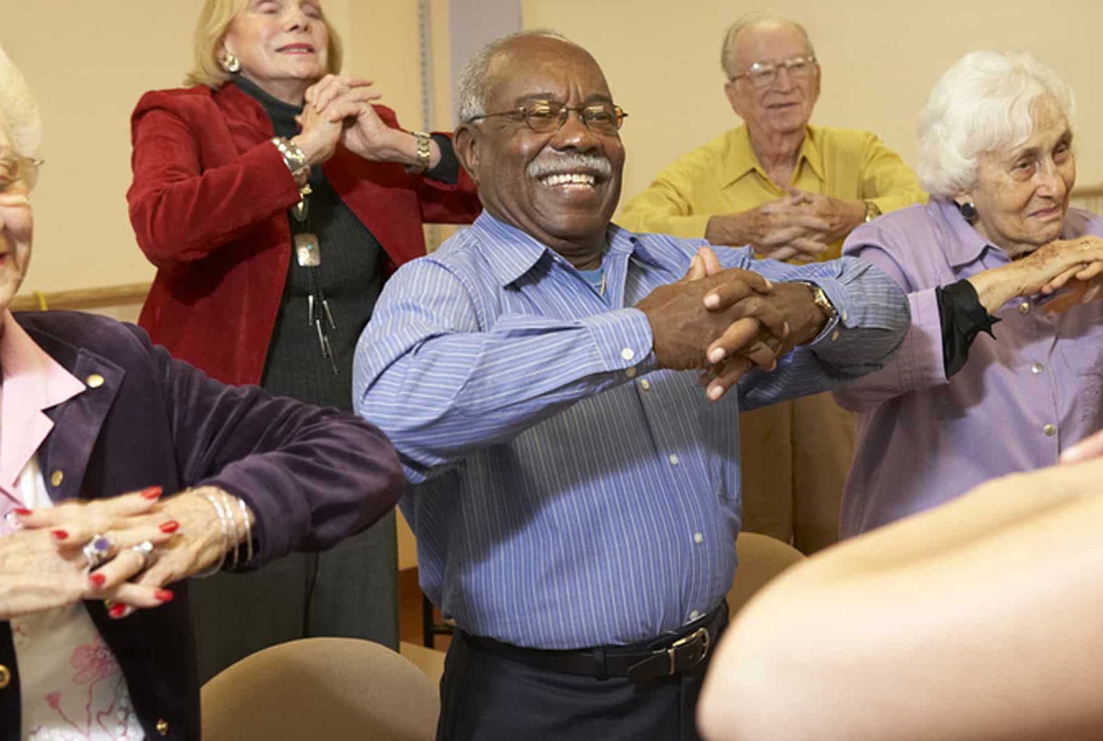 Group of Seniors Enjoying Nursing Home Activities