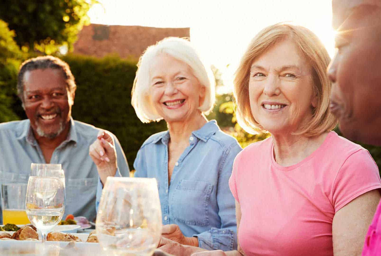 Seniors socializing over dinner