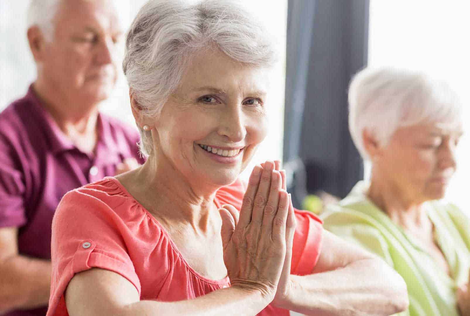 Group of Seniors Doing Yoga